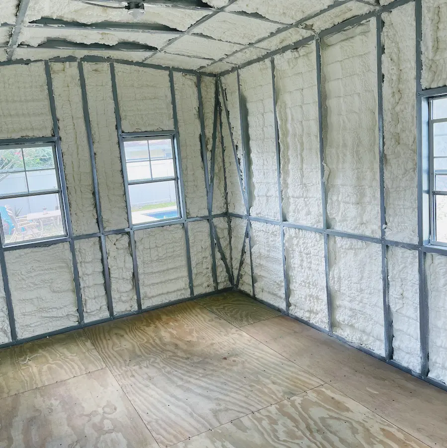 Closed-cell spray foam insulation applied to wall cavities in a residential project in Billerica